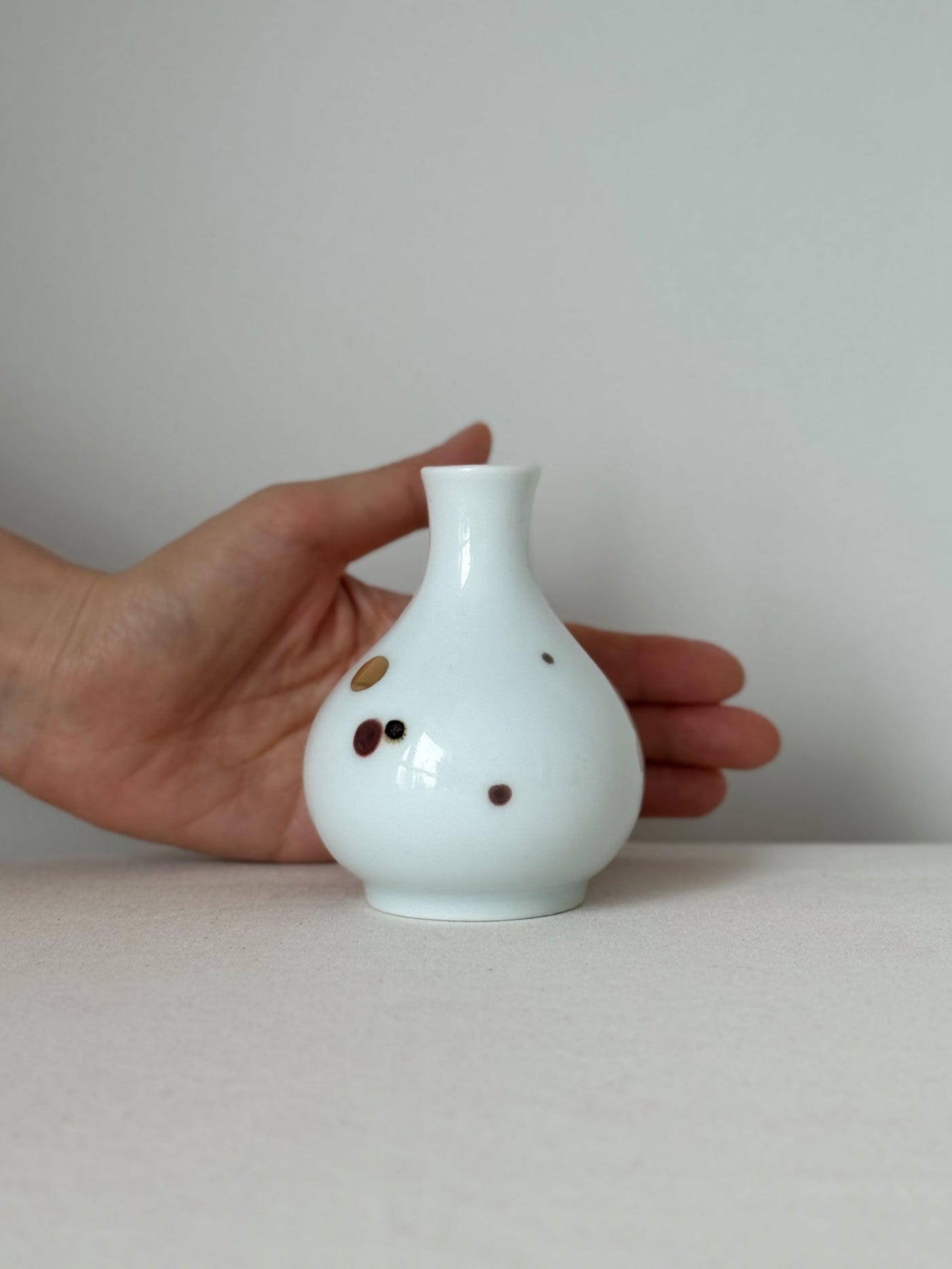 White Porcelain Bottle with Gilt Bronze Pebble Motif II (Short Neck)